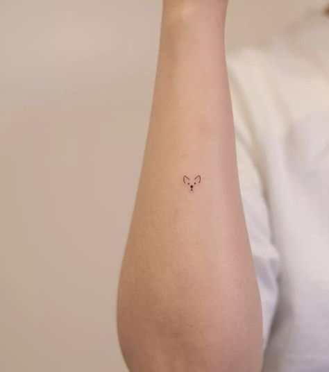 Tiny Puppy Tattoo, Subtle Dog Tattoo Simple, Dog Ears Fine Line Tattoo, Minimal Wrist Tattoos For Women, Dainty Dog Tattoo Simple, Dog Ball Tattoo, Samoyed Tattoo Minimalist, Westie Tattoo Minimalist, Tiny Tattoos Dog