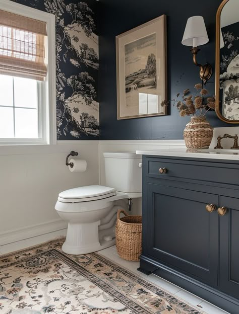 Remodel Guest Bathroom, Navy Bathroom Inspiration, Bathroom With Blue Wallpaper, Cozy Small Bathroom Ideas, Bathrooms Walls Ideas, Bathroom With Navy Cabinets, Small Bathroom Blue Walls, Navy Wall Bathroom, Timeless Half Bathroom