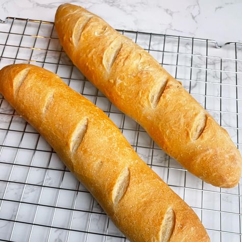 Baked French Baguette on a cooling rack. Bread Machine French Baguette, Bread Machine Baguette Dough, French Bread Dough In Bread Machine, French Baguette In Bread Machine, Bread Maker Baguette Recipe, French Baguette Recipe Bread Machines, Baguette Bread Machine Recipe, Bread Machine Baguette Recipe, Bread Machine French Bread Recipe