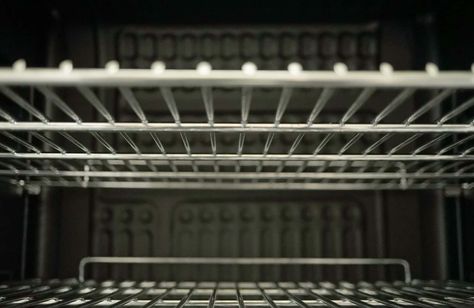 9 Quick and Easy Ways to Clean Oven Racks - Today's Homeowner Oven Rack Cleaner, Clean Oven Racks, House Plumbing, Cleaning Oven Racks, How To Install Gutters, Painted Patio, Stainless Steel Oven, Gas Oven, Cleaning Gutters