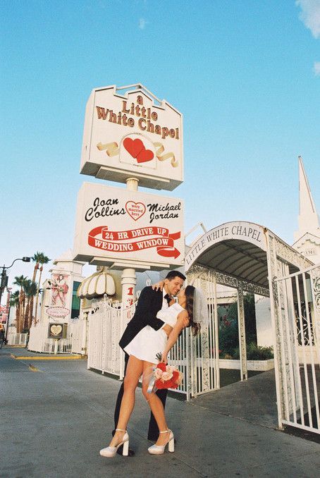 Kitschy Kodak Moments in the Heart of Las Vegas Imagine eloping in the iconic Little White Wedding Chapel, the heart of Las Vegas. Your love story is captured in the romantic hues of 35mm film by an ace film photographer. With a nod to vintage charm, you wear a short, dazzling wedding dress amid neon lights. The downtown landscape is the perfect setting for this kitschy elopement. Let your love story be as unique as you are! Little White Chapel Wedding, White Chapel Wedding, Vegas Wedding Dress, White Wedding Chapel, Grand Canyon Tours, Las Vegas Wedding Photos, Vegas Bride, Vegas Wedding Photos, Vegas Wedding Chapel