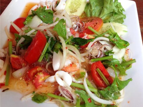 Every mouthful of this spicy seafood salad recipe offers a taste explosion of Thai flavours. Learn how to prepare authentic Yum Talay here... Asian Seafood Salad, Yum Talay Salad, Spicy Seafood Salad, Thai Seafood Salad Recipe, Thai Seafood Salad, Tai Food, Seafood Salad Recipe, Asian Salads, Thai Seafood