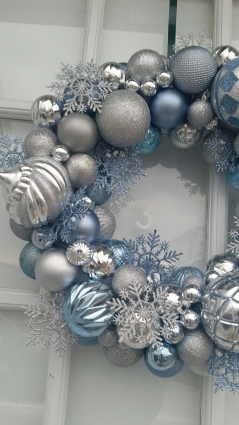 frozen theme ornament wreath blue silver christmas Blue Silver And White Christmas Wreath, Winter Wonderland Christmas Decorations Blue, Blue Silver Christmas Wreath, White Silver And Blue Christmas Decor, Blue Wreaths For Front Door Christmas, Blue And Silver Wreath Ideas, Blue Snowman Christmas Decor, Light Blue And Silver Christmas Decor, Christmas Decorations Blue And Silver