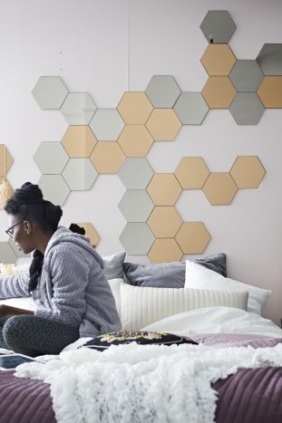 ‘Copper brings a sense of warmth and luxury to a bedroom,’ says stylist Carl Braganza. ‘With just a few packs of mirrors, you can create a statement headboard.’ Honeycomb Mirror, Hexagon Mirror, Ikea Mirror, Mirror Headboard, Ikea Bedroom, Bedroom Updates, Interior Room, Mirror Wall Stickers, Style Deco