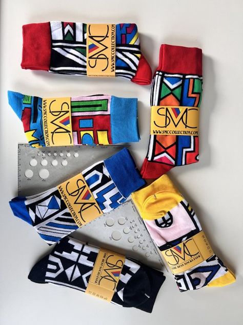 SMC African Print Socks are the perfect accessory for anyone looking to add a touch of African fashion to their wardrobe. Made with high-quality materials and featuring bold and vibrant prints, these socks are both stylish and comfortable. Whether you're dressing up or dressing down, SMC African Print Socks are the perfect way to express your unique sense of style and showcase your love for African culture. So why not add some color and flair to your wardrobe today with SMC African Print Socks? Cool Socks For Men, Sock Design, Print Socks, Shade Of Red, Socks For Men, Men's Socks, Red Design, African Culture, Designer Socks