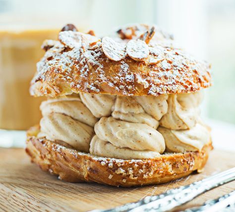 Chez Billy's Paris Brest dessert bests a Krispy Kreme any day. Photograph by Scott Suchman. Dc Food, Paris Brest, Washington Dc Travel, Dc Travel, Eat And Drink, All I Ever Wanted, Sliced Almonds, Places To Eat, Washington Dc