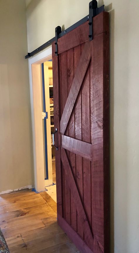 Red Wood Stain, Painted Log Cabin, Red Barn Door, Refurbishing Furniture, Red Front Door, Barn Door Closet, Inside Barn Doors, Stained Doors, Barn Garage