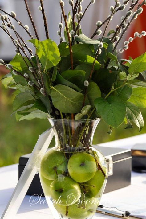 We could find those kind of twigs in Nana and Papa's backyard! :) Apples In Vases Centerpieces, Table Decorations With Apples, Green Apple Centerpiece Ideas, Fruit In Vases Centerpieces, Apple Centerpiece Ideas, Fruit Centerpiece Ideas, Nowruz Table, Apple Centerpieces, Fruit Centerpieces