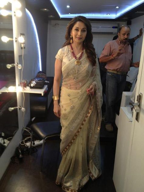 Another hit saree worn by Madhuri. For a Gujju wedding, this can also be used as a panetar. just thinking Gujju Wedding, 40 And Fabulous, Madhuri Dixit, Wedding Cake Designs, Bollywood Celebrities, How To Look Classy, Bollywood Actress, Cake Designs, Saree Designs