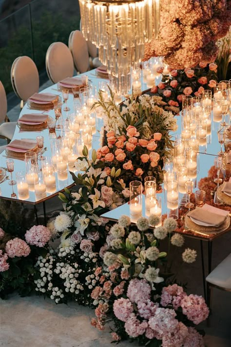 Mirrored serpentine wedding table decor with candles, flowers, and chandeliers | Image by Phosart Royalty Wedding Theme, Unique Wedding Receptions, Wedding Mirror, Wedding Chandelier, Dream Wedding Decorations, Wedding Table Flowers, Wedding Flower Decorations, Best Wedding Planner, Wedding Tablescapes