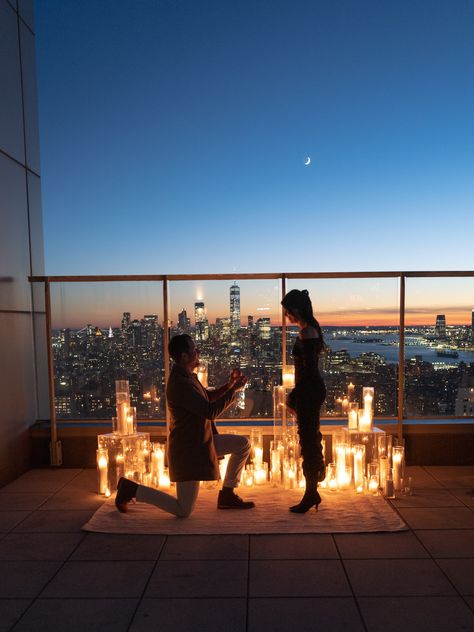 New York City proposal ideas by Marcy Blum Proposal At Night With Lights, Light Proposal Ideas, Rooftop Proposal Night, City Lights Proposal, Proposal Ideas Night, At Home Engagement Ideas, Roof Proposal, Downtown Proposal, Proposal Ideas New York