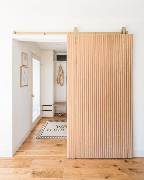 Rebekah Higgs / DIY MOM on Instagram: “I wanted the barn door in my front entrance to hang like a piece of art and add to the mid century modern vibe of my Halifax home! I shared…” Diy Mom, Modern Sliding Doors, Modern Barn Door, Closet Remodel, Street House, Front Entrance, Bed In Closet, Modern Barn, Rustic Garden Decor