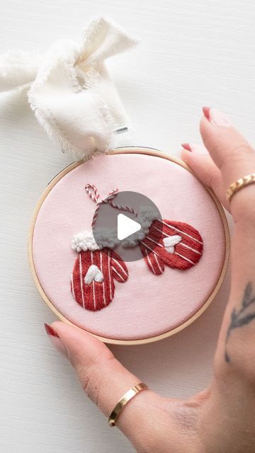 Embroidery by Emily June on Instagram: "It’s getting cold outside and it’s definitely mitten season… mixed with candy cane season. ❤️ This vintage-inspired mittens design from our Merry Magic Stick and Stitch (on sale right now!) only uses two colors and a small handful of stitches, but is sweet and unique. How to stitch up these mittens! 💖 1. Start with a Satin Stitch using 2 strands of my FAVORITE @dmc_embroidery red, 22. 2. Fill in the hearts using 3 strands of classic Blanc. First use a diagonal Satin Stitch from one “hump” towards the point, and then again over that stitch from the other direction. 3. Using 2 strands of Blanc, lay down stripes using the Straight Stitch. 4. For the cuffs, take 4 strands of Blanc and lay down the messiest French Knots you can - I wrapped my needle Stick And Stitch, Embroidery Red, Magic Stick, How To Stitch, Dmc Embroidery, Needle Point, French Knots, Embroidery Needles, Straight Stitch