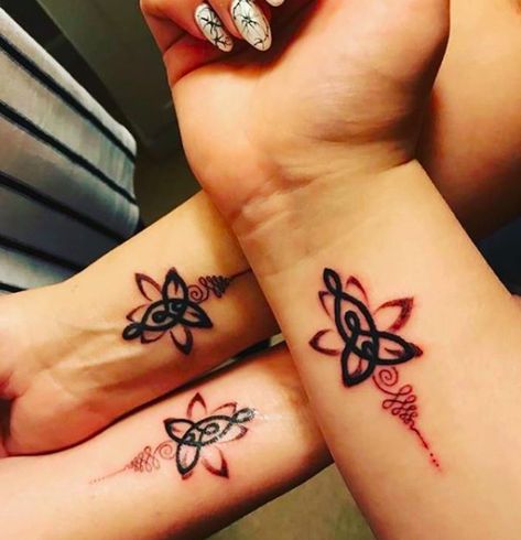 CafeMom.com : Signs & Symbols : 50 Mother-Daughter Tattoos That Celebrate an Unbreakable Bond -- Nothing bonds a mother to her daughters quite like a meaningful tattoo, especially one that looks culturally and spiritually significant. More from CafeMom: 50 Gorgeous Finger Tattoos That Deserve a Thumbs Up Mother Daughter Infinity Tattoos, Mother Tattoos For Children, Mother Son Tattoos, Mom Daughter Tattoos, Tiny Heart Tattoos, Inspiration Tattoos, Sweet Tattoos, Mother Tattoos, Tattoo For Son