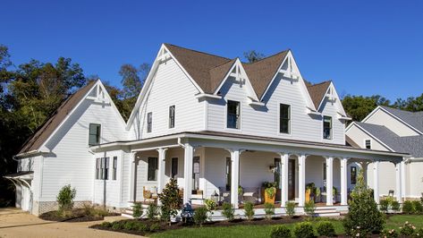 House Plan #1921: Southern Gothic | In need of some inspiration for your next home purchase? Look no further than the Street of Hope at Hallsley, one of Southern Living's own Inspired Communities in Midlothian, VA. The Street of Hope features eight designer-furnished luxury homes, six of which are beautifully modeled after Southern Living house plans. These homes showcase the latest in design trends and ideas, expertly outfitted by some of the region's leading interior designers. Wraparound Porch House Plans, Gothic House Plans, Gothic Revival House, Southern Farmhouse, Unique House Plans, Porch House Plans, Carriage House Plans, Farmhouse Architecture, Southern Living House Plans