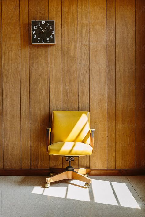 Vintage Photography  Vintage Yellow Chair with Wood Paneling in Office with Clock by Raymond Forbes Photography #stockphoto #stocksy #clock #dondraper #woodpanelling #vintage #seventies #VintagebusinessPhotography #retrophotography #americanaphotograpy #seventies #chairphotography #Midcenturymodernphotography Yellow Office Chair, Insurance Office, Cheap Desk Chairs, Office Chair Diy, Yellow Office, Vintage Office Chair, Upholstered Swivel Chairs, Retro Office, Yellow Chair