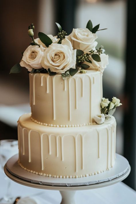 Looking for the perfect simple wedding cake? These 70+ cakes are a flawless mix of simplicity and elegance. Each design showcases the beauty of minimalism, making them ideal for brides who love timeless style. #perfectwedding #simplecakes #weddingdaygoals Simple Elegant White Wedding Cake, Wedding Cake 2 Layer, White Wedding Cakes Elegant, 2 Tier Wedding Cake With Flowers, Simple Wedding Cake 2 Tier Classy, Simple Two Tier Wedding Cake, One Layer Wedding Cake, Simple Elegant Wedding Cakes, Timeless Wedding Cake