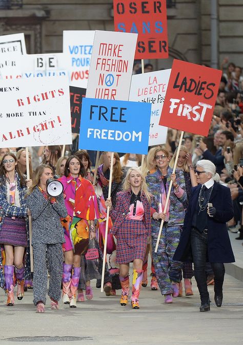 Models Take Chanel's Paris "Protests" Beyond the Runway: Karl Lagerfeld is no stranger to bringing artistic drama to the runway, and his latest fashion show stunt is already making headlines worldwide. Protest Fashion, Fashion Show Runway Stage, Runway Stage, Feminist Protest, Karl Lagerfeld Fashion, Spring 2015 Fashion, Catwalk Models, Jean Patou, Protest Signs