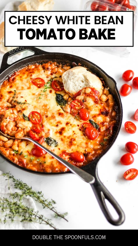 This cheesy white bean tomato bake has a a simple tomato confit as the base of this recipe and is super delicious. This recipe has a list of simple and delicious ingredients that truly make this recipe one you’ll keep coming back to again! Cheese White Bean Tomato Bake, Cheesy White Bean Tomato Bake Nyt, White Bean And Tomato Bake, Cheesy White Bean Tomato Bake, Baked Cherry Tomato Recipes, White Bean Tomato Bake, White Bean Tomato, Baked Tomato Recipes, Veggie Casseroles