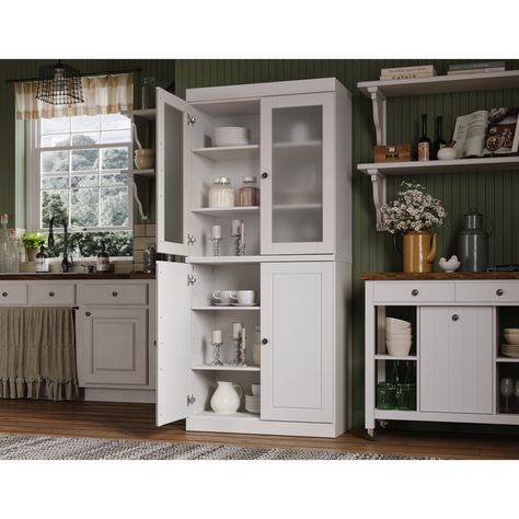 Experience the timeless elegance and unmatched durability of our 100% solid wood 32-wide modular kitchen pantry cabinet. Crafted to stand the test of time, this pantry embodies the essence of quality craftsmanship and functionality.