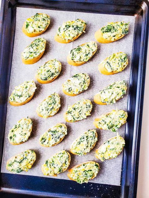 Looking for an easy appetizer recipe? Try these Spinach Artichoke Dip Crostini! With savory cheeses plus spinach and artichokes, it's quick to make and full of flavor. The toasted crostini makes it the perfect finger food idea. Spinach Artichoke Crostini, Artichoke Crostini, Easy Spinach Artichoke Dip, Crostini Toppings, Spinach Artichoke Dip Easy, Toasted Crostini, Crostini Appetizers, Spinach And Artichoke Dip, Crostini Recipes