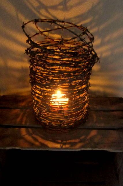 create a rustic atmosphere barbed wire and candle, crafts, repurposing upcycling, Rusty Barbed Wire Candle Holder Wire Home Decor, Barbed Wire Decor, Barb Wire Crafts, Wire Candle Holder, Barbed Wire Art, Western Crafts, Barn Wood Crafts, Horseshoe Crafts, Old Barn Wood