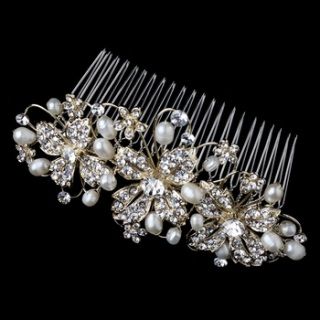 A truly exquisite composition of lovely light gold plated flowers encrusted with glittering clear rhinestones and luminous ivory freshwater pearls prance along this charming bridal comb. Bring an extra touch of elegance to your bridal hairstyle with this stunning and superb hair comb.  4" x 2" Rose Gold Bridal Accessories, Rose Gold Wedding Accessories, Floral Bridal Comb, Pearl Comb, Gold Bridal Hair Comb, Hair Accessories Tiara, Bridal Hair Combs Pearl, Wedding Comb, Pearl Hair Combs