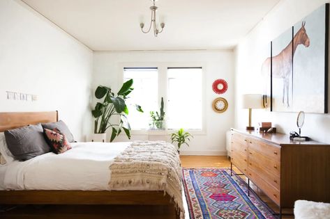 Avoid these bedroom design mistakes to make your sleep space a happier place. Rugs Layout, Banana Plant, Spanish Style Home, Dekorasi Kamar Tidur, Spanish Style Homes, Eclectic Bedroom, Wooden Floors, 아파트 인테리어, Mediterranean Home