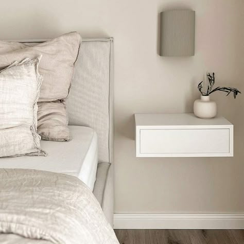 The comfortable push-opening system eliminates the need for a handle and makes the Riccardo floating bedside table an authentic piece of design. One Bedside Table In Bedroom, Hanging Bedside Table, Cute Bedside Table, Floating Bedside Tables, Wall Bedside Table, Floating Bedside Shelf, Wall Wardrobe Design, Minimalist Side Table, Floating Bedside Table