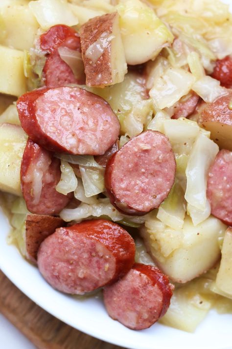 Instant Pot smoked sausage, red potatoes and cabbage with Old Bay seasoning. An easy one pot meal! Smoked Sausage Cabbage And Potatoes, Sausage Cabbage And Potatoes, Instant Pot Smoked Sausage, Smoked Sausage Cabbage, Sausage Instant Pot, Cabbage Kielbasa, Crockpot Cabbage, Sausage Cabbage, Paleo Casserole