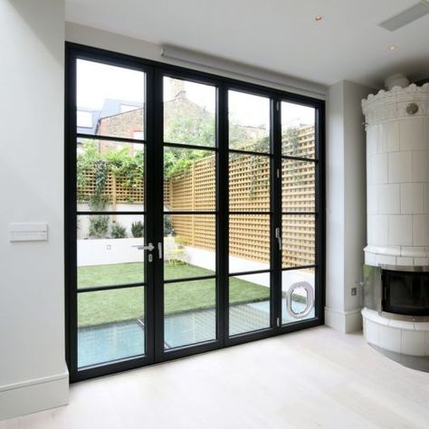 Steel Look Bifolding Doors | Mondrian® Glazing | Steel Industrial Style Glazing Bifold Doors Onto Patio, Crittal Doors, Bifold Patio Doors, Door Aesthetic, Crittal Windows, Modern Renovation, Sliding Patio Doors, Kitchen Extension, Aesthetic Ideas