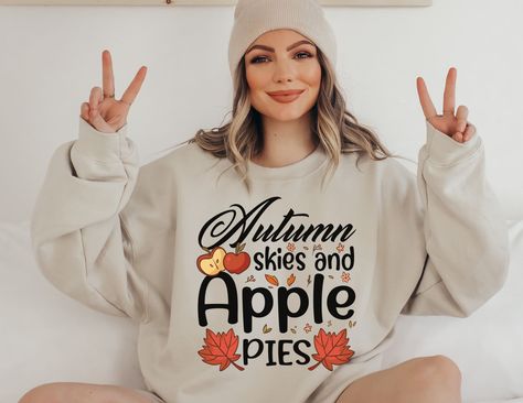 Autumn skies and apple pies by E-STYLE Fall Gender Reveal Outfit For Mom, Baby Feet Pumpkin, Pumpkin Patch Pregnancy Announcement, November Pregnancy Announcement, Unique Pregnancy Announcement Ideas, Thanksgiving Pregnancy Shirt, Thanksgiving Baby Announcement, Thanksgiving Pregnancy Announcement, Fall Pregnancy