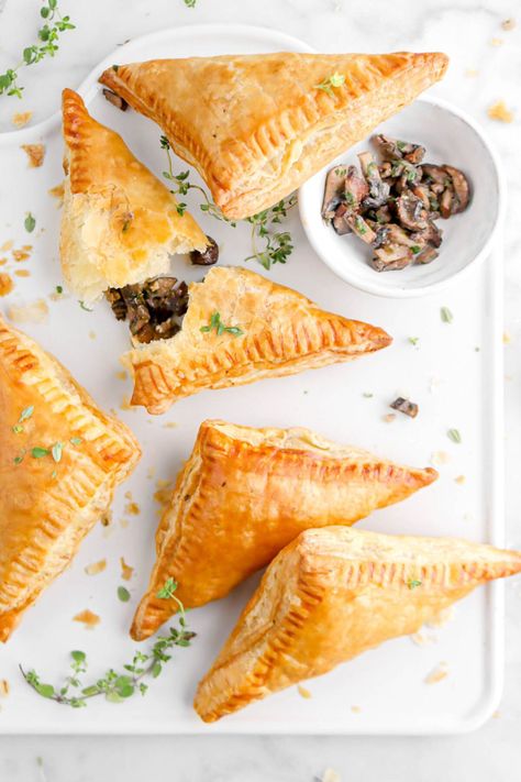 Flakey, buttery, and oh so DELICIOUS Mushroom Duxelles and Goat Cheese Turnovers…aka the perfect appetizer for anytime of year! Easy to... Cheese Turnovers, Homemade Fig Newtons, Peanut Snack, Cheese Empanadas, Toffee Popcorn, Rough Puff Pastry, Bakers Table, Crowd Pleasing Appetizers, Roasted Pecans