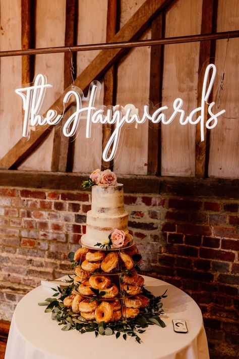 Cake Table Backdrop Goals! The Haywards chose to hang their surname Neon on our Copper Frame behind the cake table to make these pictures extra special! It then made a fab backdrop for the dance floor too #winning Photo - @benjaminstuartphotography Venue - @lillibrooke_weddings Cake: @celebcakesbycatherinescott Flowers: @sonningflowers Neon Cake, Luxury Event Decor, Cake Table Backdrop, Neon Cakes, Rose Gold Wedding Decor, Table Backdrop, Corporate Events Decoration, Statement Decor, Elizabeth James