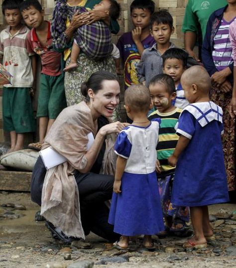 UNHCR special envoy Angelina Jolie Pitt shakes hands with Kachin ethnic refugee children as she visits Eight Miles Palana IDP camp in Myitkyina capital city of Kachin state, Myanmar on July 30, 2015. Angelina Jolie Humanitarian, Italian Courses, Learning New Skills, Spanish Courses, Science Learning, Humanitarian Work, Career Vision Board, Jolie Pitt, Future Jobs