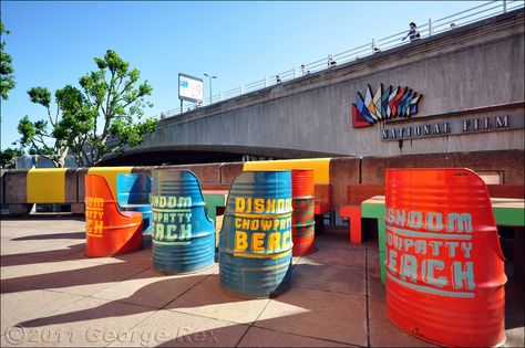 Southbank Centre celebrates the 60th anniversary of the Festival of Britain. Oil drum seating for the  Dishoom Chowpatty Beach pop-up, between the Purcell Room and Waterloo Bridge. Festival Seating, Terrace Seating, Drum Seat, Open Restaurant, Unique Seating, Waterloo Bridge, Bbq Steak, Plant Kitchen, Seating Ideas