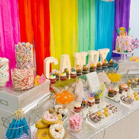 Indulge in a candy lover's paradise! Explore creative concepts and practical tips to design an unforgettable candy table for any occasion. Get the tips now. Dessert And Candy Table Ideas, Rainbow Birthday Dessert Table, Dessert Candy Table Ideas, Pastel Rainbow Candy Table, Candy Bars Ideas For Parties, Sweets Table Ideas Birthday, Rainbow Candy Table, Candy Table Ideas Birthday, Candy Corner Ideas