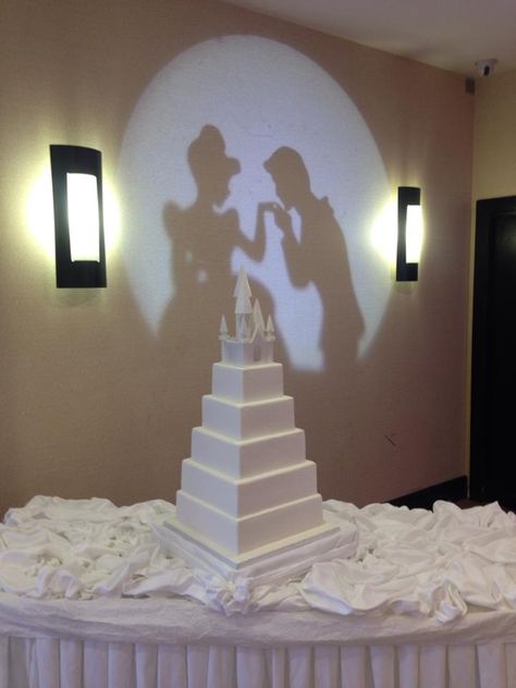 wedding-cake-projection-mapping | Disney themed wedding idea, fairytale silhouette light or prince and princess behind cake wall #disney #disneywedding Disney Silhouette Wedding Cake, Princess Wedding Ideas, Princess Theme Wedding, Fairytale Silhouette, Cake Mapping, Irish Wedding Cake, Irish Cake, Disney Themed Wedding, Cake Dummy