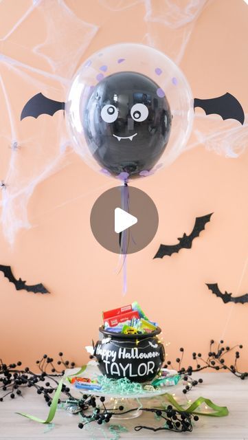 oh shiny! ⟡ balloons • party • gifts on Instagram: "Halloween flying bat cauldron!!! 🦇 Now available for preorder, super limited amounts this year 🫨 

🖤 Each personalized cauldron has their name and is filled with candy, treats, activities, all wrapped up with glowy twinkle lights underneath the bat balloon and decorated with even more bats!! 

🖤 Order link in bio for Pasadena pick up or delivery 

#halloween #boobasket #bats #spookyseason #halloweenideas #halloweentreats" Shiny Balloons, Bat Balloon, Candy Cauldron, Flying Bat, Candy Treats, Balloons Party, Twinkle Lights, Halloween Candy, Party Balloons