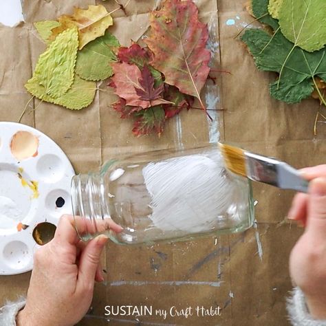 If you've ever wanted to modge podge on glass jars, you can do so while making fall leaf luminaries. Find the craft and instructions here. Modge Podge On Glass, Mod Podge On Glass, Leaf Luminaries, Modge Podge Crafts, Modge Podge Glass, Mod Podge Glass, Mod Podge Pictures, Mod Podge Gloss, Flower Resin Jewelry