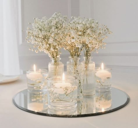 Baby's Breath And Candles Centerpiece, Wedding Glam Decor, Wedding Table Decorations Round Tables Candles, Mirror Wedding Table Decor, Simple Elegant Flower Centerpieces, Simple Wedding Centrepieces Round Tables, Homemade Centerpieces Wedding, Wedding Round Centerpieces, Gypsophelia Centre Piece