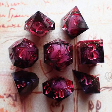 False Life Dice | Necromancy (red variant) ❤️💀 Inky, nefarious wisps of black intermingle with a core of red, accented with colorshift glitter & ink. The … | Instagram Custom Dnd Dice, Ttrpg Aesthetic, Dnd Dice Aesthetic, Necromancy Magic, Dice Inspiration, Dice Aesthetic, Dnd Aesthetic, Cool Dice, Dice Ideas