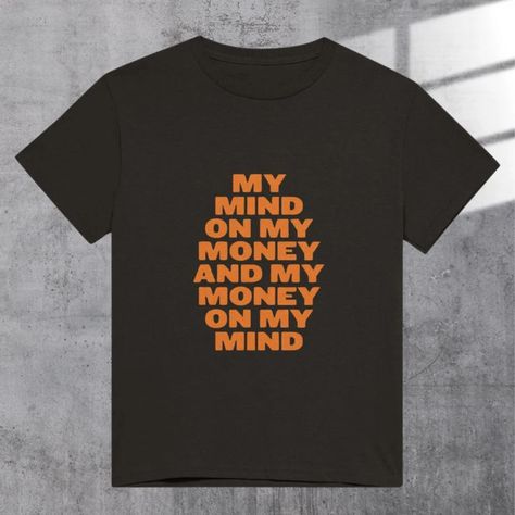 Our "Notorious BIG money on my mind" t-shirt is more than just apparel; it's a tribute to the essence of old school rap. Crafted with the true fan in mind, this shirt features the iconic quote from one of the greatest rappers of all time 🫶 Old School Rap, Quote Tshirt, Rap Quotes, Money On My Mind, Biggie Smalls, Notorious Big, Big Money, On My Mind, T Shirts With Sayings