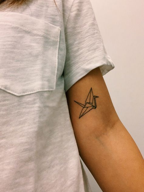 Origami Tattoo Design, Paper Crane Tattoo With Flowers, Origami Tattoo Ideas, Minimalist Crane Tattoo, Paper Crane Tattoo Meaning, Origami Crane Tattoo, Origami Bird Tattoo, Fine Line Paper Crane Tattoo, Origami Birds Tattoo