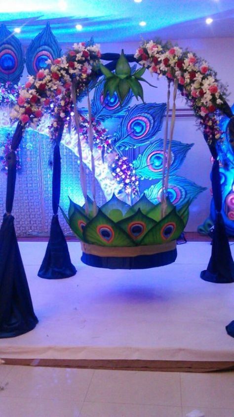 Peacock theme Cradle ceremony decoration #weddingceremonydecor #wedding #ceremony #decor #cases Naming Ceremony Ideas, Name Ceremony, Cradle Decoration, Ganpati Decoration Theme, Naming Ceremony Decoration, Baby Naming Ceremony, Ganpati Decor, Ganesh Chaturthi Decoration, Cradle Ceremony