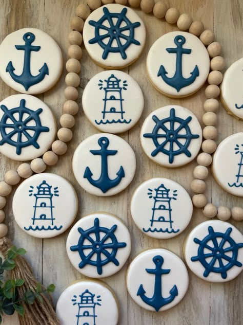 Royal Icing cookies. Hand piped lighthouse, ships wheel & anchor. Boating Cookies Decorated, Nautical Birthday Cookies, Nautical Theme Cookies, Nautical Cookies Decorated, Cruise Cookies, Lighthouse Cookies, Boat Cookies, Cookie Dessert Table, Fishing Cookies