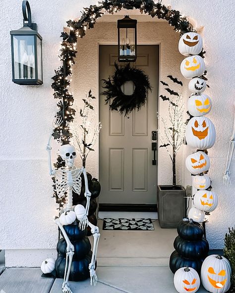 Last year’s Halloween front porch. Debating how early I can get away with setting out decorations before my husband objects. It’s never too early, right? 🙃🦇👻🧡 #LTKhome #liketkit #LTKSeasonal #ltkfall #fall #falldecor #halloween #halloweendecor #spookyseason #halloweenideas #halloweendiy #skeleton #pumpkinarch @shop.ltk Halloween Apartment Front Door Decorations, Halloween Apartment Decor Front Doors, Small Porch Halloween Decor, Front Door Halloween Decor, Apartment Front Doors, Porch Update, Halloween Gourds, Halloween House Decoration, Halloween Front Porch Decor