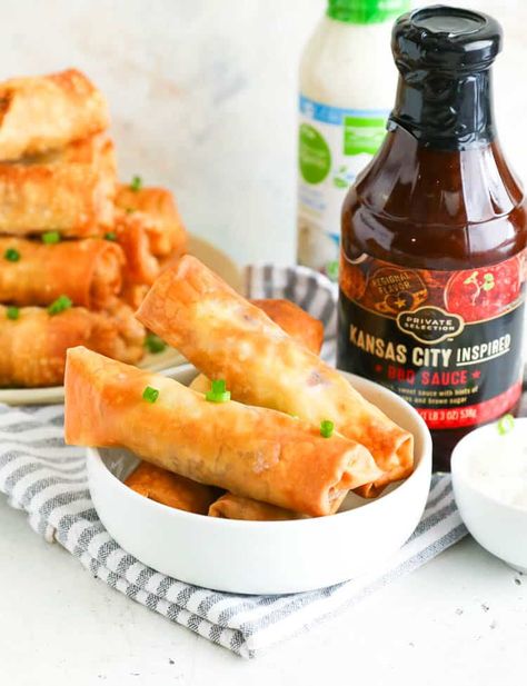 Pulled Pork Egg Rolls - Immaculate Bites Party Appetizers Pulled Pork Egg Rolls, Pork Egg Roll Recipes, Easy Pulled Pork, Pork Egg Rolls, Leftover Pork, Crowd Pleasing Appetizers, Egg Roll Recipes, Egg Roll Wrappers, Shredded Pork