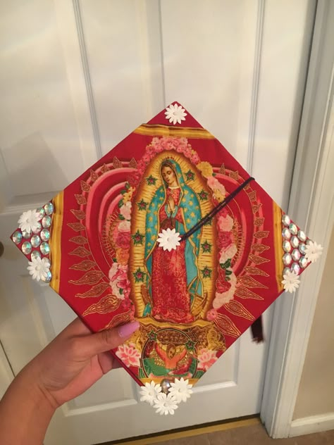 virgen de guadalupe Graduation cap College Graduation Cap Ideas Mexican, Virgin Mary Cap Decoration, Virgen Graduation Cap, Cap Decoration Graduation High School Mexican, Catholic Graduation Cap, Virgencita Graduation Cap, Virgin Mary Graduation Cap, Mexican Graduation Cap Designs, 2024 Graduation Cap Ideas