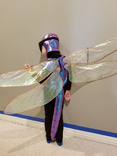 My four-year-old insisted on being a dragonfly this year for Halloween. When I couldn’t find any costume “fairy wings” that could pass for dragonfly wings, I decided to make them myself. I was please… Diy Bug Wings, Dragon Fly Costume, Dragonfly Outfit, Dragonfly Costume, Wings Costume Diy, Fly Costume, Spotted Lanternfly, Giant Dragonfly, Bug Costume